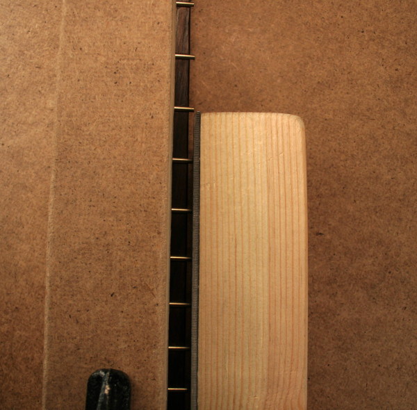 Bevel the frets with a homemade fret beveling file