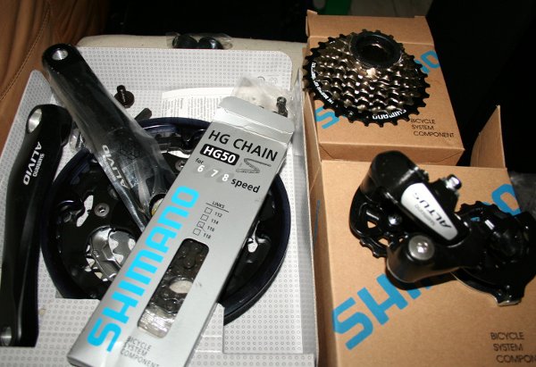 New Shimano bike parts, front chainwheel, multiple freewheel, rear derailleur and bike chain