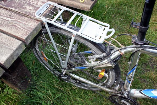 Garden bench used as a bike lift
