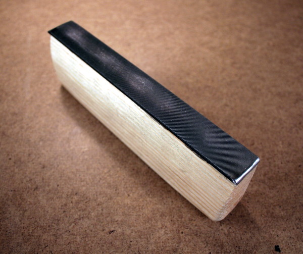 Custom-made fret leveling file with rounded edges